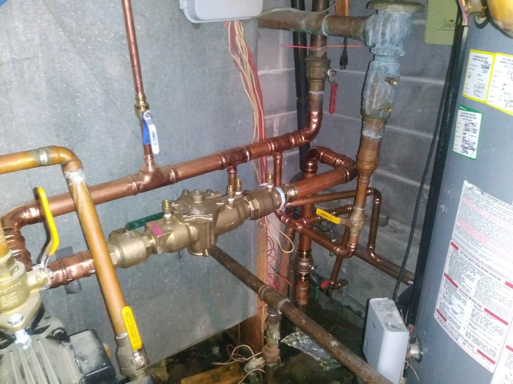 Slide of Iron Plumbing & Construction