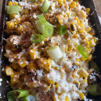 Saint Anejo - Side of elote corn - Cocktail Bars Near Me - Nashville, Tennessee
