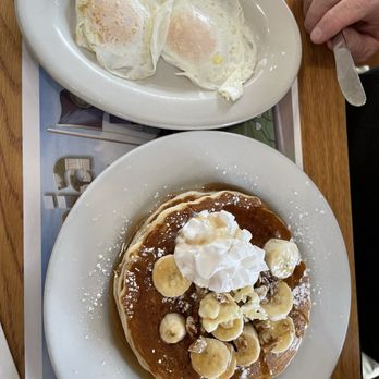The Smokey Griddle Pancake House - Banana pancakes & 2 eggs $16!! Pricey! They don't have real maple syrup :( - New American Near Me - Williamsburg, Virginia