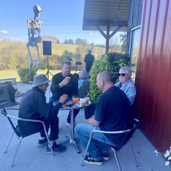 Bourbon Excursions - Having a whiskey slushy on the patio outside Whiskey Thief. - Bus Tours Near Me - Louisville, Kentucky