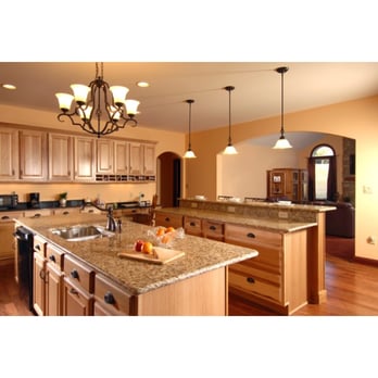 Tomlinson Builders - a kitchen with a center island - General Contractors Near Me Tomlinson Builders - a kitchen with a center island - General Contractors Near Me