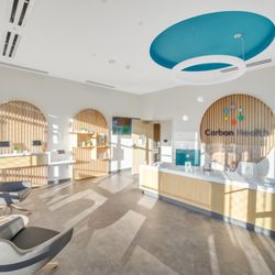 Carbon Health Urgent Care Aurora - Aurora front desk, lobby and waiting room
