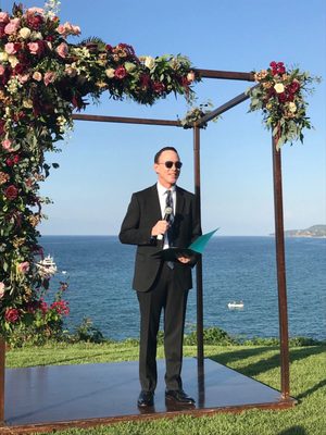 Wedding Officiant - If you want a memorable wedding ceremony, do yourself a favor and hire Eric as your officiant! We had such a positive experience with Eric who completely made our vision come to life. Eric has a calm and comforting presence that makes it easy to open up about your relationship and discuss what you want for your wedding day. Because of him we were able to create a unique, sentimental and fun wedding ceremony.
From start to finish the experience was seamless. During the initial consult Eric took his time to talk to us about what we envisioned for our ceremony, and he got to know us as a couple, individually and spiritually. He had amazing ideas on special touches to incorporate, like the beautiful haiku about our relationship that we will never forget! He did a great job helping us blend traditional wedding vows with our own unique approach, that made the ceremony feel very personal. Eric was also great about checking in before our wedding day to review everything, which helped put our minds at ease.
After our wedding we received so many compliments from our guests about how amazing Eric was and to this day we have family members talk about how much they loved our wedding ceremony. We will forever cherish the amazing memories Eric helped us create. Wedding Officiant - If you want a memorable wedding ceremony, do yourself a favor and hire Eric as your officiant! We had such a positive experience with Eric who completely made our vision come to life. Eric has a calm and comforting presence that makes it easy to open up about your relationship and discuss what you want for your wedding day. Because of him we were able to create a unique, sentimental and fun wedding ceremony.
From start to finish the experience was seamless. During the initial consult Eric took his time to talk to us about what we envisioned for our ceremony, and he got to know us as a couple, individually and spiritually. He had amazing ideas on special touches to incorporate, like the beautiful haiku about our relationship that we will never forget! He did a great job helping us blend traditional wedding vows with our own unique approach, that made the ceremony feel very personal. Eric was also great about checking in before our wedding day to review everything, which helped put our minds at ease.
After our wedding we received so many compliments from our guests about how amazing Eric was and to this day we have family members talk about how much they loved our wedding ceremony. We will forever cherish the amazing memories Eric helped us create.