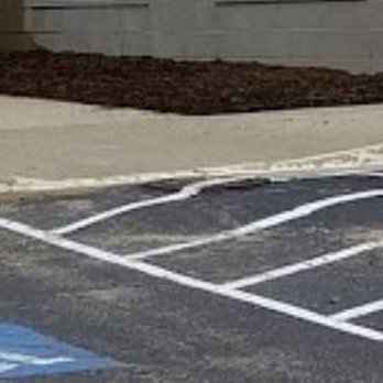 Five Guys - Handicapped pathway has a large raised manhole cover with a hump of asphalt around it, making in dangerous for handicapped folks. - Burgers Near Me - Burke, Virginia Five Guys - Handicapped pathway has a large raised manhole cover with a hump of asphalt around it, making in dangerous for handicapped folks. - Burgers Near Me - Burke, Virginia