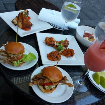 The Blue Hen - We couldn't decide so we ordered 1 of everything on the happy hour menu couldn't all fit on the table - American Near Me - Rehoboth Beach, Delaware