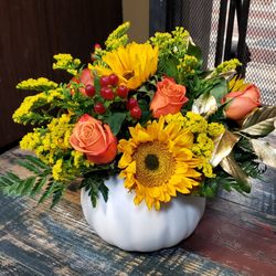 Kirtland Flower Barn - Fun twist on autumn with a white pumpkin.