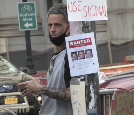 Photo of City Hall Park - New York, NY, US. I attended a rally at City Hall Park & this man stalked me around the park to, I guess, SURVEIL me. I got this photo of him staring me down.