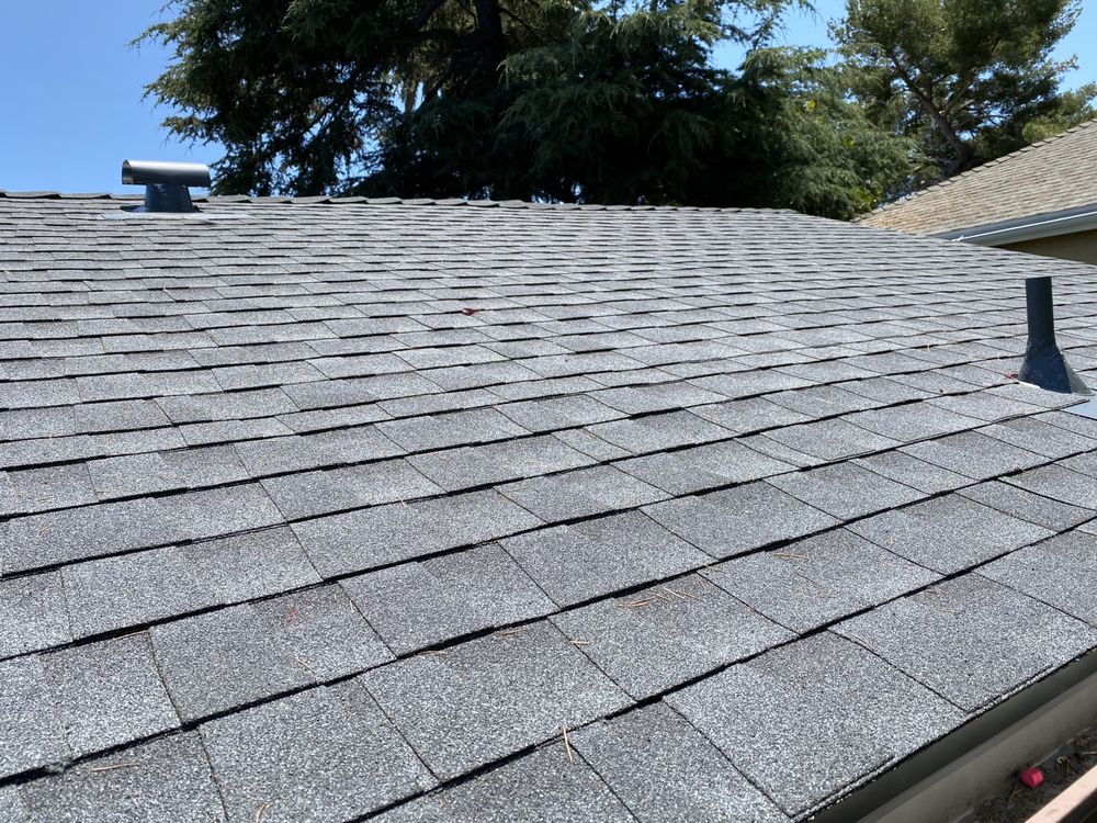 Slide of MTZ Roofing & Gutters