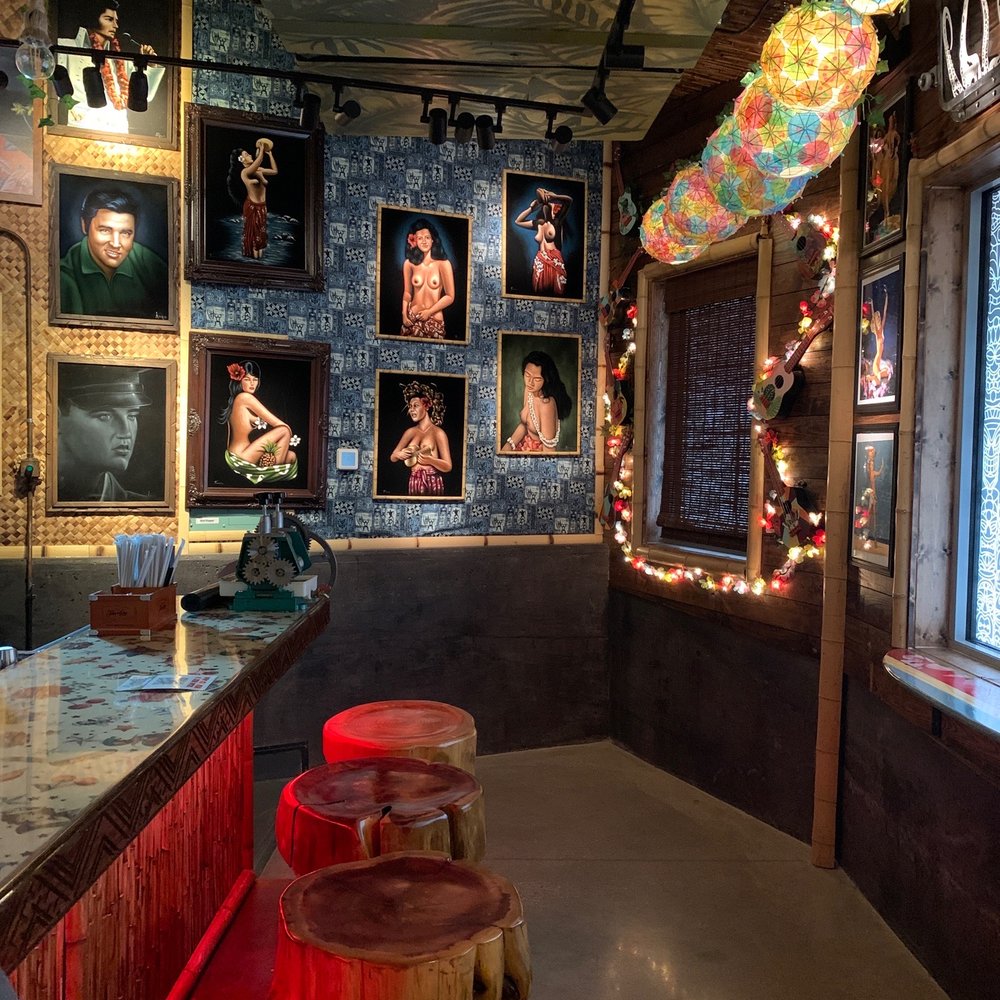 limin lounge - a bar with stools and pictures on the wall - Lounges Near Me - The Colony, Texas
