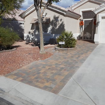 Unity Land Construction - a driveway in front of a house - Landscaping Near Me - North Las Vegas, Nevada Unity Land Construction - a driveway in front of a house - Landscaping Near Me - North Las Vegas, Nevada