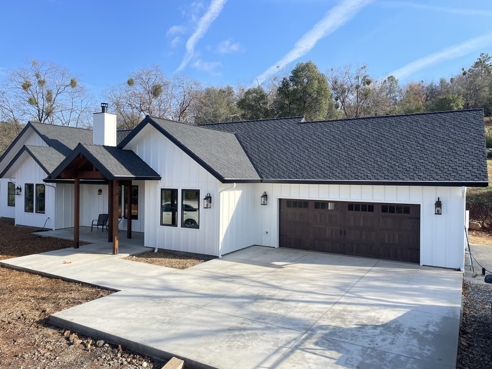 Slide of JMK Roofing