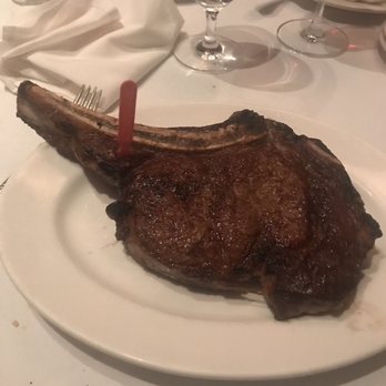 Benjamin Steakhouse - Bone-In Rib Eye Steak perfectly medium rare - Steakhouses Near Me - White Plains, New York