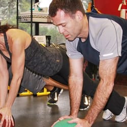 Define Fitness - Small group training class pulling off a difficult exercise!