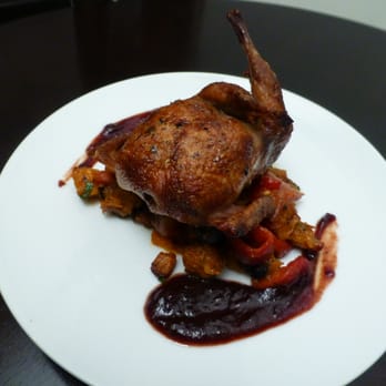 Le Chateau - Seared duck breast, cranberry glaze, served with roasted vegetables - French Near Me - La Crosse, Wisconsin