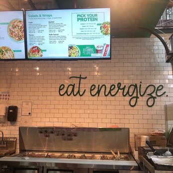 Freshii - a restaurant kitchen with a menu displayed on the wall - Fast Food Near Me - Vancouver, British Columbia Freshii - a restaurant kitchen with a menu displayed on the wall - Fast Food Near Me - Vancouver, British Columbia