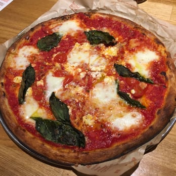 Blaze Pizza - Incomplete, they threw it in the oven before I could finish building it. Notice the 3 grape tomatoes? Poor topping distribution. - Pizza Near Me - Pasadena, California Blaze Pizza - Incomplete, they threw it in the oven before I could finish building it. Notice the 3 grape tomatoes? Poor topping distribution. - Pizza Near Me - Pasadena, California