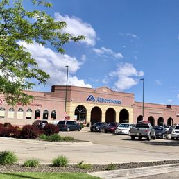 cars parked in front of a building