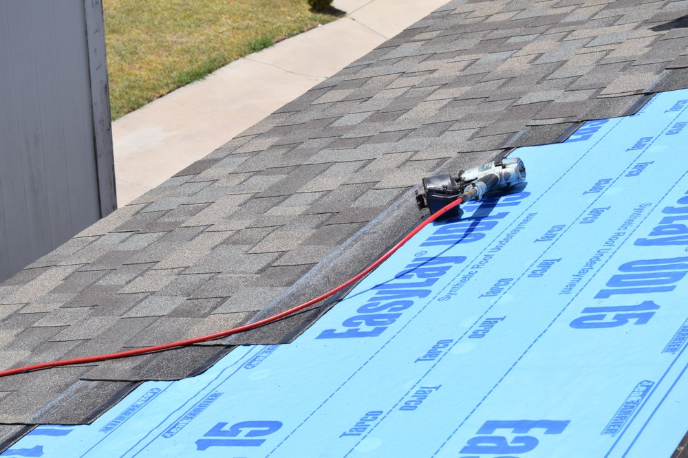 Slide of Top Notch Roofing