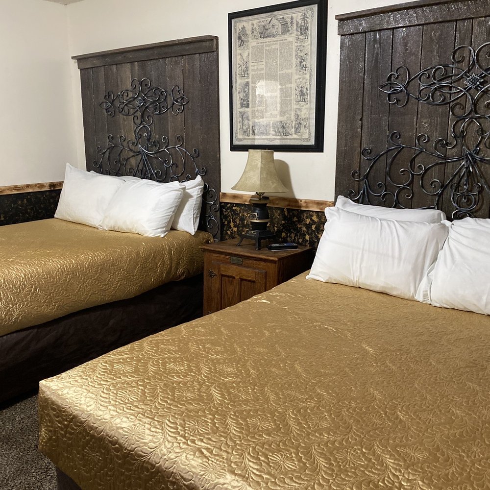 Black Bear Motel - The 2 beds. Look at the axe on wall-meat. - Hotels Near Me - Davenport, Washington Black Bear Motel - The 2 beds. Look at the axe on wall-meat. - Hotels Near Me - Davenport, Washington