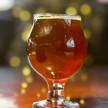 The 649 - a glass of beer on a table - Beer Bar Near Me - Beaverton, Oregon The 649 - a glass of beer on a table - Beer Bar Near Me - Beaverton, Oregon