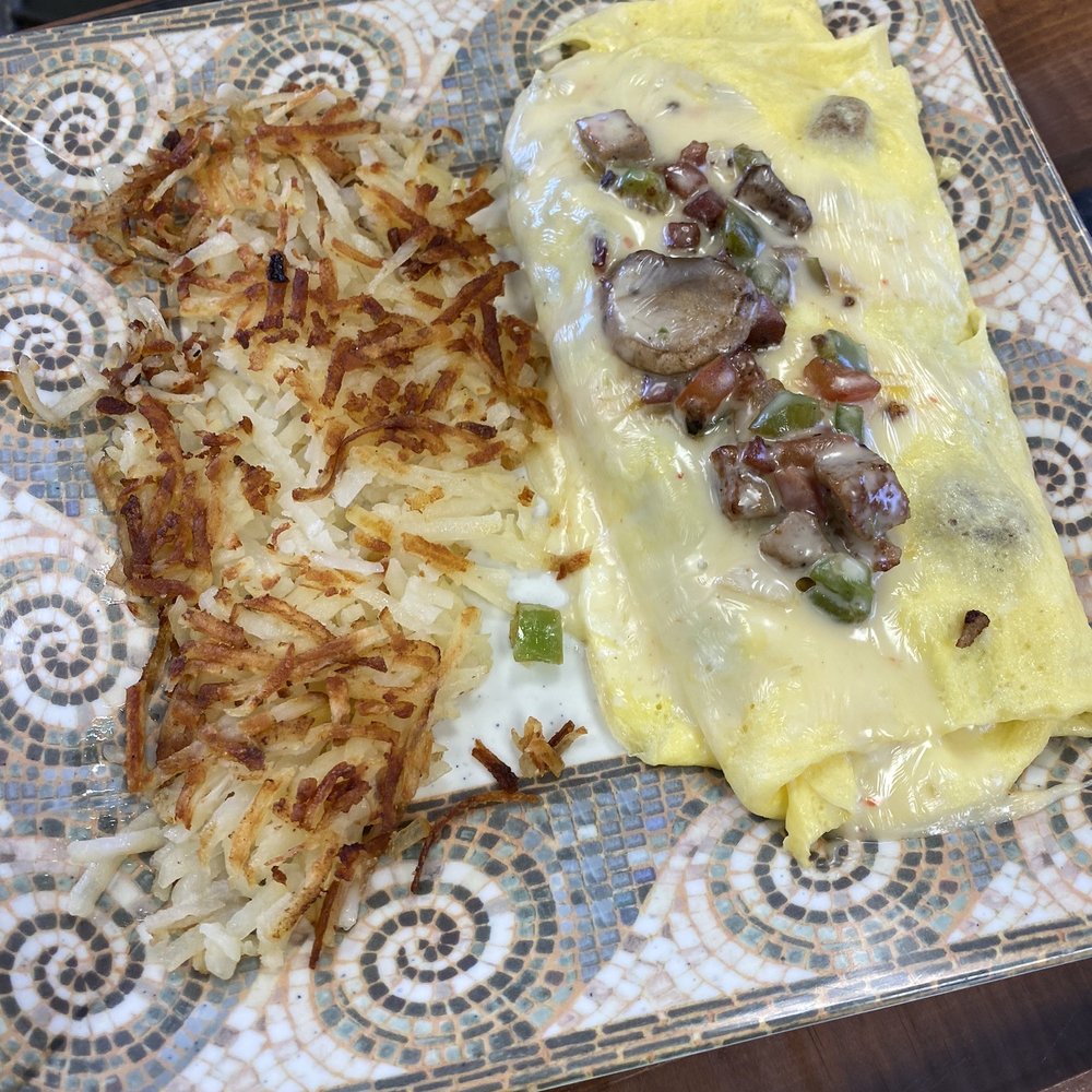 an omelet and hash browns an omelet and hash browns