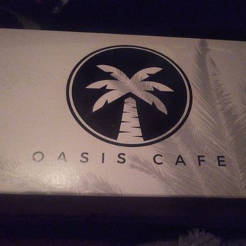 Oasis Cafe - The box the slices came in.  Cute. - Bakeries Near Me - New York, New York
