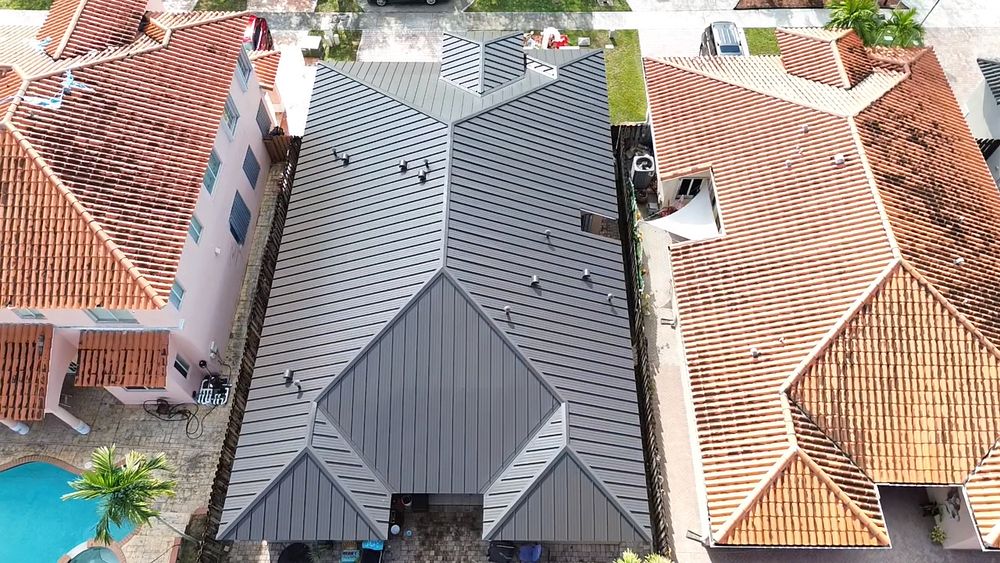 Slide of MC Roofing Service