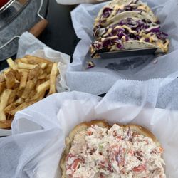 Tiki Bar at Beach Walk - Lobster roll, fries, Chicken tacos, and onion rings