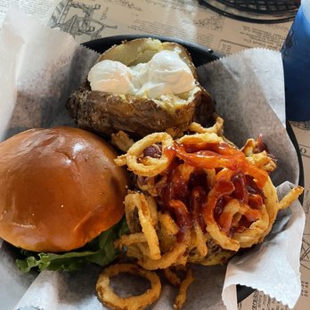 Ground Restaurant - Bbq cheddar burger covered in onion straws with a baked potato. - American Near Me - Franklin, Tennessee