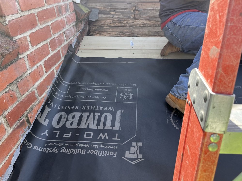 Slide of Nicks roofing and tree services