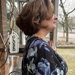 My clients new hairstyle and clothing g styled for her busy Realitor , family life .