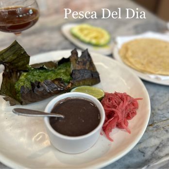 Este - Pesca Del Dia. Tile fish with lemony herb. Keto-friendly just skip the tortillas and order avocado slices like I did. Great! - Seafood Near Me - Austin, Texas Este - Pesca Del Dia. Tile fish with lemony herb. Keto-friendly just skip the tortillas and order avocado slices like I did. Great! - Seafood Near Me - Austin, Texas