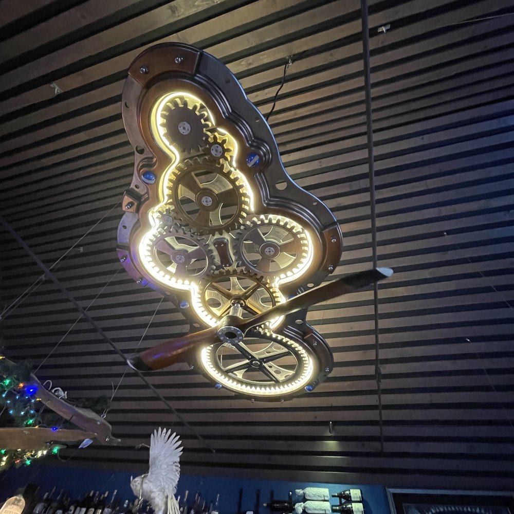 West Side Tavern - Cool gear light in main room - Gastropubs Near Me - Longmont, Colorado West Side Tavern - Cool gear light in main room - Gastropubs Near Me - Longmont, Colorado