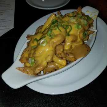 nooch. a vegan eatery - Vegan poutine fries - Vegan Near Me - Windsor, Ontario nooch. a vegan eatery - Vegan poutine fries - Vegan Near Me - Windsor, Ontario