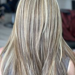 In-Style Hair Salon - Back view of a chunky blonde hi-lite and lo-lite on a long layer look--by Lily.