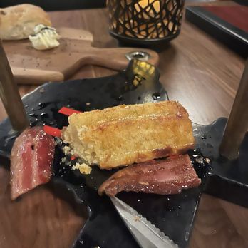 Double Cut Steak House - Hanging bacon (already cut) - Steakhouses Near Me - Round Rock, Texas Double Cut Steak House - Hanging bacon (already cut) - Steakhouses Near Me - Round Rock, Texas
