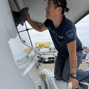 Blue Rose Auto - Treston polishing our Bigfoot travel trailer! - Auto Detailing Near Me - Springfield, Oregon Blue Rose Auto - Treston polishing our Bigfoot travel trailer! - Auto Detailing Near Me - Springfield, Oregon