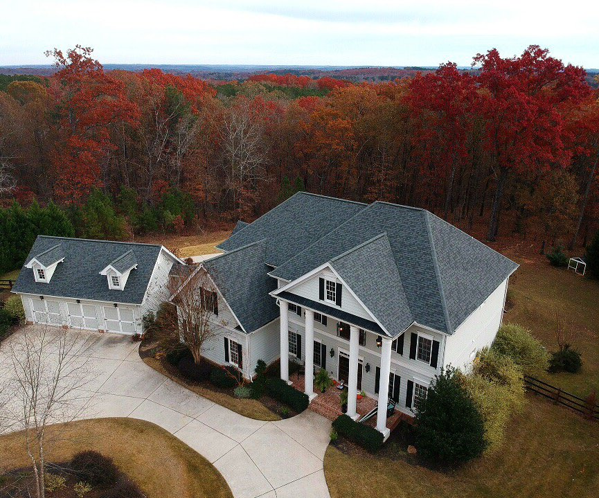 Slide of Whitaker Roofing Company