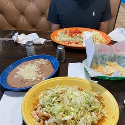Mi Hacienda - He got one of the burritos and I got Pollo cheese dip with beans on the side