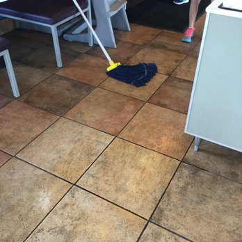 Taco Bell - No employees around mop left and a wet floor. - Fast Food Near Me - Commerce City, Colorado Taco Bell - No employees around mop left and a wet floor. - Fast Food Near Me - Commerce City, Colorado