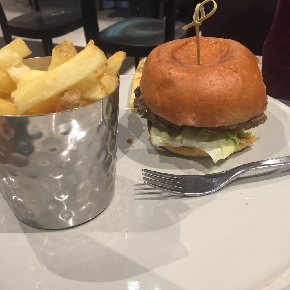 Pilots Bar & Kitchen - Hamburger with lettuce and tomatoes. - Bars Near Me - Hounslow, XGL Pilots Bar & Kitchen - Hamburger with lettuce and tomatoes. - Bars Near Me - Hounslow, XGL