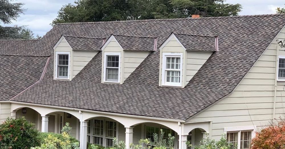 Slide of Exclusively Roofing