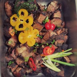 St. Bess Finest Cuisine - Jerk Pork...slow-cooked, smoked on the grill...SPICY GOOD!!!
