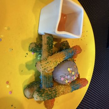 Virgin Voyages - Rainbow churros (Meh) from Razzle Dazzle - Boat Tours Near Me
