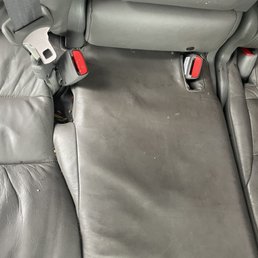 Back seat not vacuumed or wiped down Back seat not vacuumed or wiped down