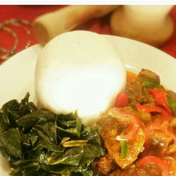 Fufu, and Vegetable Soup with Goat meat