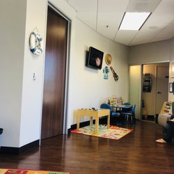 Coastal Kids - Waiting room, usually a movie for kids is always playing on the TV