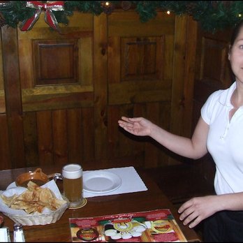Cervecería Tijuana - My server was completely unaware that I was in the process of taking her photo, after she placed my beer, chips and salsa on the table. - Beer Bar Near Me - Tijuana, BCN