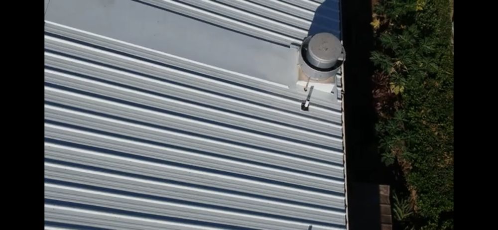 Slide of First Class Roofing