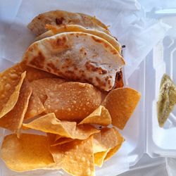 Spanglish - Soft beef tacos with tortilla and medium verde salsa
